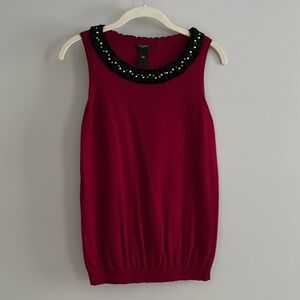 Ann Taylor top with pearl type beading at neckline. Size M